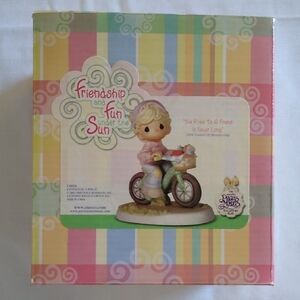 Precious Moments Child on Bicycle Figurine - Multicolor